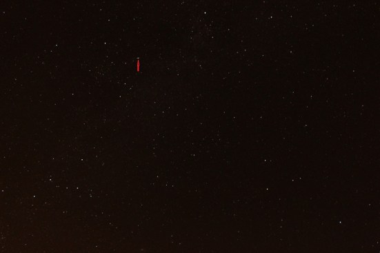 Solar flare, indicated by the red arrow?